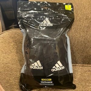 Rarely used Adidas soccer shin guards, size small